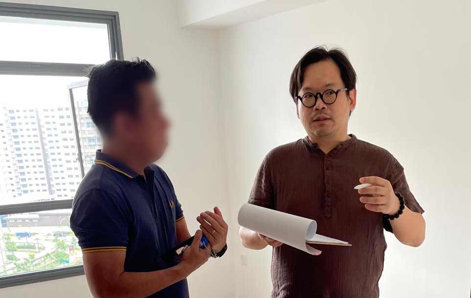 Justin Ho conducting a Feng Shui consultation